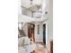 Elegant foyer featuring a staircase, high ceilings, and hardwood floors at 185 Players Club Dr, Castle Rock, CO 80104
