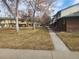 Complex with green space and walkways at 502 S Carr St, Lakewood, CO 80226