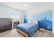 Charming bedroom with a mural and a window offering plenty of natural light at 11684 Park South Loop, Parker, CO 80138
