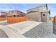 Exterior view of a home with a two-car garage and spacious driveway at 11684 Park South Loop, Parker, CO 80138