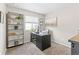 Functional home office with natural light, ample storage, and neutral color palette at 11684 Park South Loop, Parker, CO 80138