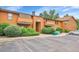 Inviting multi-Gathering building featuring a private balcony, parking, and lush landscaping at 3335 S Ammons St # 6-105, Lakewood, CO 80227