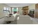 Cozy living room features a stone fireplace and contemporary decor at 3335 S Ammons St # 6-105, Lakewood, CO 80227