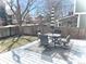 Relaxing backyard featuring a patio set and an umbrella, perfect for outdoor entertainment and summer enjoyment at 2414 S Gray Dr, Lakewood, CO 80227