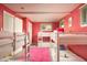 Bright bedroom featuring multiple bunk beds, perfect for a shared or guest space at 7039 Otis Ct, Arvada, CO 80003