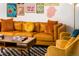 Inviting living room with warm colors and comfortable seating arrangements at 7039 Otis Ct, Arvada, CO 80003