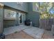 Small fenced backyard with patio, grill, and storage shed at 17111 E Stanford Ave # C, Aurora, CO 80015