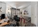 Bright bedroom with a gaming setup and a comfortable chair at 17111 E Stanford Ave # C, Aurora, CO 80015