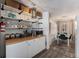 Well-equipped kitchen with ample storage and a view into the dining area at 17111 E Stanford Ave # C, Aurora, CO 80015