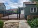 Community pool with deck and gated access at 17111 E Stanford Ave # C, Aurora, CO 80015
