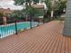 Community pool with large deck and surrounding fence at 17111 E Stanford Ave # C, Aurora, CO 80015