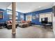 Cozy basement with comfortable seating, entertainment area, and natural light, perfect for relaxing at 6995 S Kendall Blvd, Littleton, CO 80128