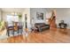 Bright dining area with hardwood floors and a wooden dining table with chairs at 2325 15Th Ave, Longmont, CO 80503