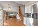 Modern kitchen with stainless steel appliances and a view of the living room at 2325 15Th Ave, Longmont, CO 80503