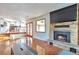 Bright living room featuring a fireplace and kitchen view at 2325 15Th Ave, Longmont, CO 80503