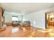 Living room with hardwood floors and a cozy sectional sofa at 2325 15Th Ave, Longmont, CO 80503