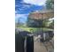 Outdoor patio area with an outdoor dining set and large yard at 2226 Weatherstone Cir, Highlands Ranch, CO 80126