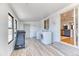 Bright laundry room featuring a modern washer and dryer at 7621 Granada Rd, Denver, CO 80221