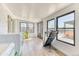 Sunlit laundry room with lots of windows and backyard views at 7621 Granada Rd, Denver, CO 80221