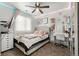 Bedroom with modern decor, ceiling fan, and vanity area at 3230 S Decatur St, Denver, CO 80236