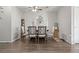 Dining area with modern table set, ceiling fan and decorative wall hangings at 3230 S Decatur St, Denver, CO 80236