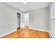 Bedroom with hardwood floors and closet at 26752 Vosler St, Conifer, CO 80433