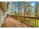 Large wooden deck with natural surroundings at 26752 Vosler St, Conifer, CO 80433