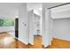 Hallway with closet and view to kitchen at 26752 Vosler St, Conifer, CO 80433