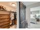 Spacious closet offers built-in shelving and ample storage space with easy access to the bedroom at 12881 Park Creek Way, Firestone, CO 80504