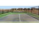 A fenced pickleball court ready for a match at 12881 Park Creek Way, Firestone, CO 80504