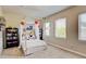 Spacious bedroom featuring a canopy bed and large windows at 1362 Golden Eagle Way, Louisville, CO 80027