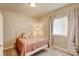 Cozy bedroom features a comfortable bed, soft lighting, and a relaxing ambiance at 1362 Golden Eagle Way, Louisville, CO 80027
