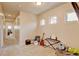 Charming bonus room featuring musical instruments and plenty of space for Gathering fun and entertainment at 1362 Golden Eagle Way, Louisville, CO 80027