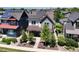 Attractive two story home with solar panels, landscaping, and a cozy front porch at 1362 Golden Eagle Way, Louisville, CO 80027