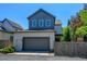 Detached garage with extra parking and a fenced in yard at 1362 Golden Eagle Way, Louisville, CO 80027