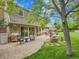 Secluded backyard with a patio, fire pit, and comfortable seating area at 7030 S Fillmore Ct, Centennial, CO 80122