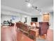 Basement area with wood-look floors and a variety of seating options at 7030 S Fillmore Ct, Centennial, CO 80122