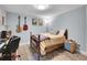 Bedroom with a full-sized bed, area rug and musical themed decor at 7030 S Fillmore Ct, Centennial, CO 80122