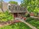 Beautiful home with manicured landscaping and a cozy front patio seating area at 7030 S Fillmore Ct, Centennial, CO 80122