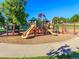 A colorful and fun playground featuring slides, climbing structures, and various play areas at 7030 S Fillmore Ct, Centennial, CO 80122
