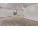 Large basement space with carpeted floors, recessed lights, and an open floor plan at 8696 W 86Th Cir, Arvada, CO 80005