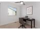 Bedroom with a modern desk setup and a large window at 8696 W 86Th Cir, Arvada, CO 80005