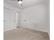 Bedroom with white walls, modern lighting, and double closets at 8696 W 86Th Cir, Arvada, CO 80005