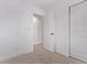 Cozy bedroom features a neutral color scheme and includes two closet spaces at 8696 W 86Th Cir, Arvada, CO 80005