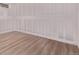 Bedroom with unfinished drywall and baseboards, and light wood flooring at 8696 W 86Th Cir, Arvada, CO 80005