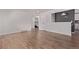 Spacious living room boasting beautiful hardwood floors and contemporary design elements at 8696 W 86Th Cir, Arvada, CO 80005