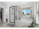 Bathroom with a tub, walk-in shower, window and plants at 6454 Leathers Ln, Parker, CO 80134