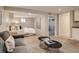 Open basement layout with a cozy living area and comfortable bedroom space, perfect for relaxation at 1615 Osceola St, Denver, CO 80204