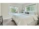 Cozy bedroom featuring plush carpeting and bright windows at 1615 Osceola St, Denver, CO 80204