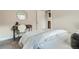 Comfortable bedroom with a stylish desk and a view into the hallway at 1615 Osceola St, Denver, CO 80204